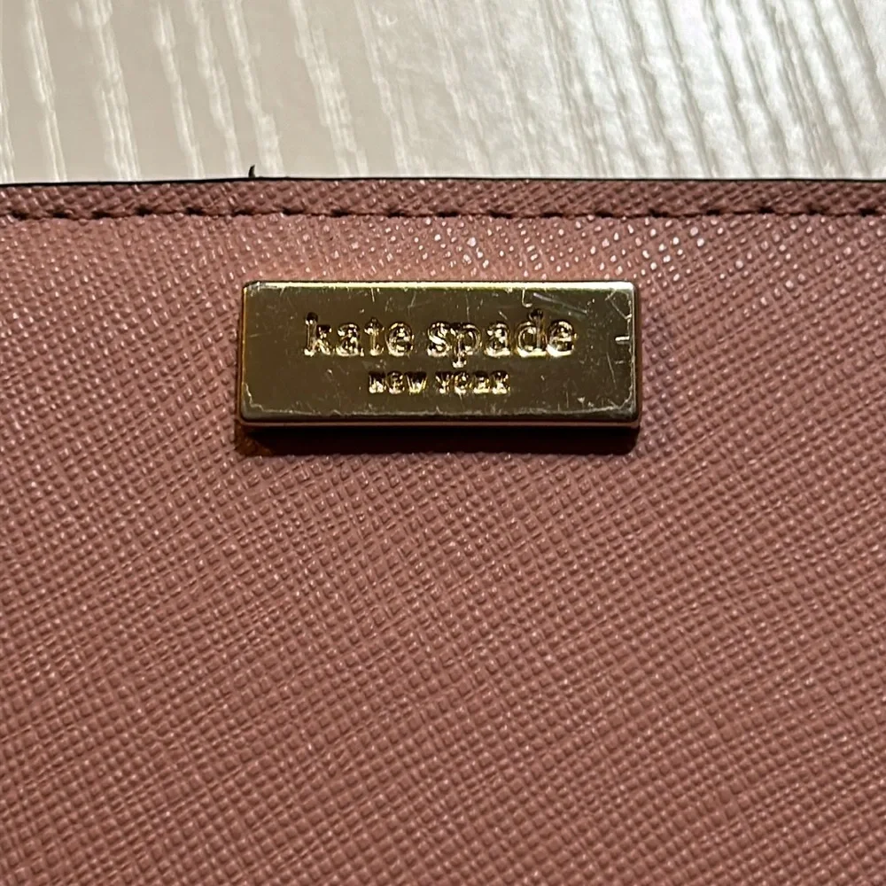 Like new Kate spade leather mauve dusty pink 2 fold wallet